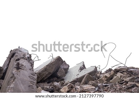 Grey concrete fragments of a destroyed building isolated on a white background. The cut object.