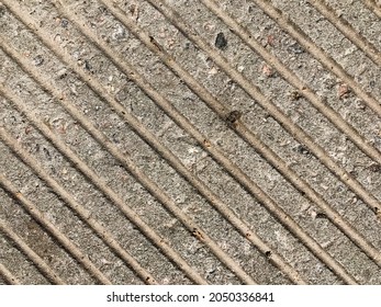Grey concrete slab with heterogeneous texture and diagonal stripes. Detailed texture. - Shutterstock ID 2050336841