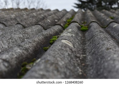 Grey dangerous asbestos roof, texture background