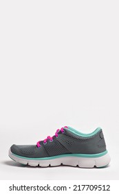 Grey And Emerald Green And Magenta(purple) Running Shoes Side View Isolated White.