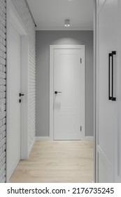 Grey Entrance Hallway With Wardrobe And White Doorway To The Living Room. Close Up