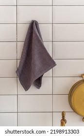 Grey Kitchen Towel On A Light Kitchen Hanger