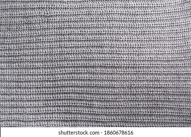 Grey Knitted Blanket.Texture For Background Or Illustrations.