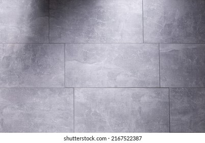 Grey laminate or tile background at floor texture. Gray flooring laminate top view - Shutterstock ID 2167522387