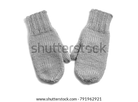 Grey mittens isolated on white background