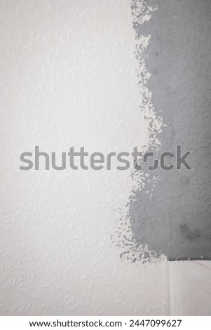 grey painted woodchip wallpaper texture pattern backgroung.