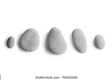 Grey pebbles isolated on white background