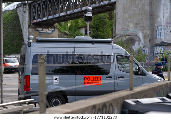 Grey police van for the\
operation controllers. Photo taken May 10th, 2021, Zurich,\
Switzerland.