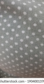 Grey Polkadot Pattern On The Shirt