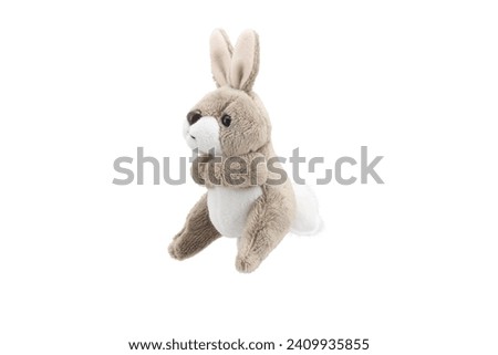 grey rabbit doll plaything for kids isolated on white background. child soft toys collection. top view character puppet. grey and white rabbit.