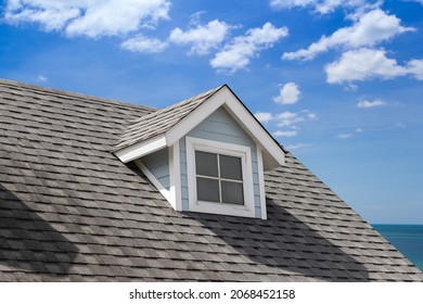 grey roof shingle with with garret house. house roof near sea in morning time. - Shutterstock ID 2068452158