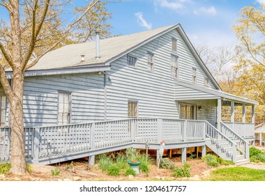 Grey Siding House With Wheelchair Ramp