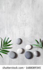 Grey Spa Background, Spa Concept, Palm Leaves And Grey Stones, Top View