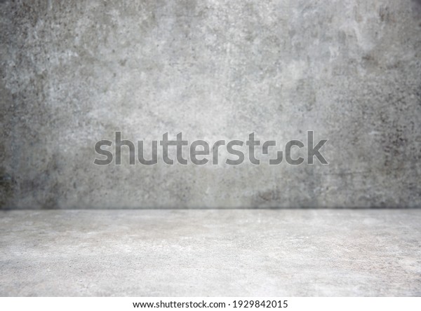 Grey\
stone grungy stage,empty room background,free space interior.Cement\
wall.Advertisement design studio.Modern\
backdrop.