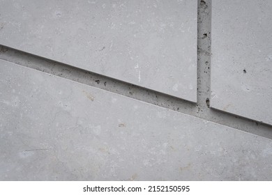 Grey Stone Texture Background. Creative, Geometric, Monochrome Backdrop. Dark Wall Decorative Tiles Surface. Modern Construction Materials. Lines And Joints On House Exterior. Close Up, Copy Space