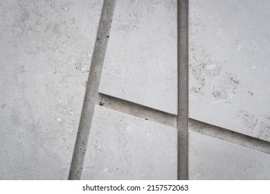 Grey Stone Texture Background. Creative, Geometric, Monochrome Backdrop. Dark Wall Decorative Tiles Surface. Modern Construction Materials. Lines On House Exterior. Close Up, Copy Space