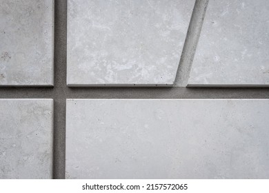 Grey Stone Texture Background. Creative, Geometric, Monochrome Backdrop. Dark Wall Decorative Tiles Surface. Modern Construction Materials. Lines On House Exterior. Close Up, Copy Space