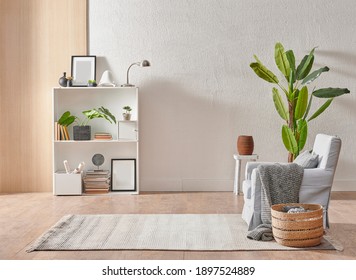 Grey Stone Wall Interior Room With Wooden Decor, Bookshelf, Sofa And Vase Of Plant, Middle Table, Carpet, Home Decoration.