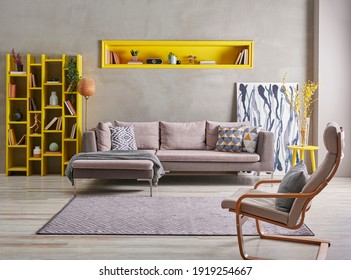 Grey Stone Wall And Sofa Style With Yellow Detail Niche Bookshelf, Carpet Design, Home Decoration Interior Style.