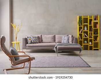 Grey Stone Wall And Sofa Style With Yellow Detail Niche Bookshelf, Carpet Design, Home Decoration Interior Style.