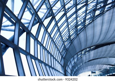 grey unusual geometric ceiling of office building - Powered by Shutterstock