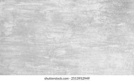 A grey wall abctract texture background with a few scratches and marks. The wall is very plain and has no decoration