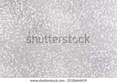 A grey wall abctract texture background with a few scratches and marks. The wall is very plain and has no decoration
