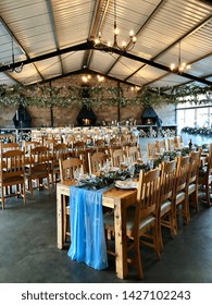 GREYTOWN, SOUTH AFRICA - 9 JUNE 2019: Tables and chairs setup for a wedding reception in Greytown. The KwaZulu-Natal Midlands are a popular wedding destination due to the rustic settings. Editorial.