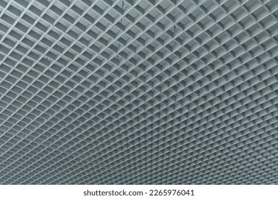 grid ceiling background is beautiful because it is designed to cover traces of original ceiling resulting in modern grid ceiling pattern. backdrop of ceiling is decorated with steel in grid pattern.