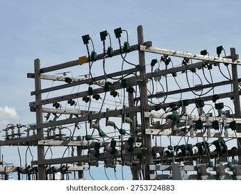Grid infrastructure and transmission framework structures rising across open prairie sky in rural Alberta energy corridor.