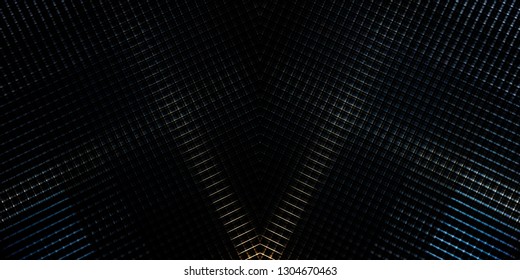 Grid structure. Close-up of modern architecture fragment. Diagonal geometric composition with parallel lines of louvers / blinds / shutters in darkness with flecks of sunlight.