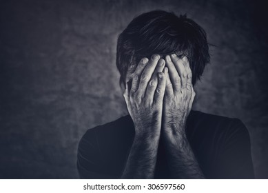 Grief, Man Covering Face And Crying, Monochromatic Image