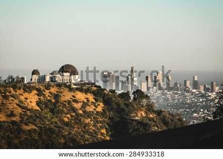 Griffith Observatory with a beautiful view on Los Angeles Downtown when the sunset, California