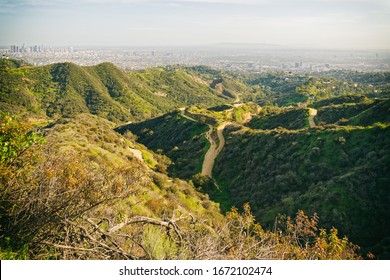 Griffith Park hiking trail and spectacular view of downtown Los Angeles from Hollywood Hills