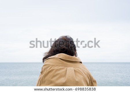 Similar – Senior sportswoman looking at the sea