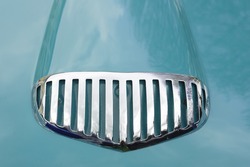 Grille Of A Vintage Car On A Blue Background