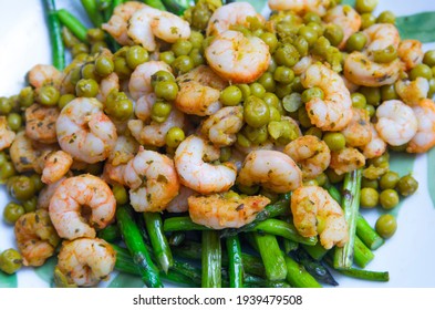 Grilled Asparagus, Shrimp And Pea Salad For Lunch On A White Plate