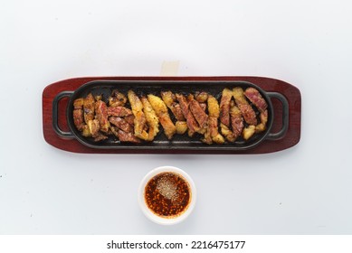 Grilled Beef Brisket With Jaew Sauce 
 White Background