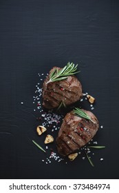 Grilled Beef Filet Mignon Steaks, Black Wooden Surface, Top View