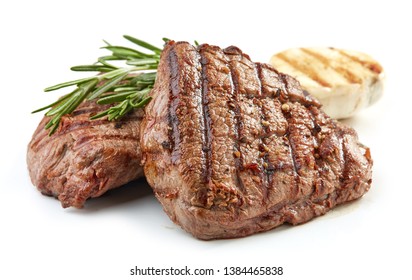 grilled beef fillet steak meat isolated on white background - Shutterstock ID 1384465838