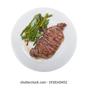 Grilled Beef Steak With Asparagus In A White Plate