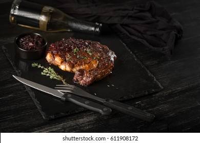 Grilled Beef Steak And Beer On Black Background. Copy Text Area For Menu Design. Horizontal Flat Top View. Overhead.