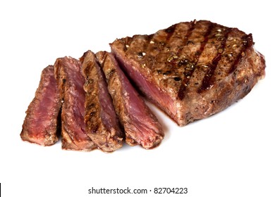 Grilled Beef Steak, Sliced, Isolated On White Background.