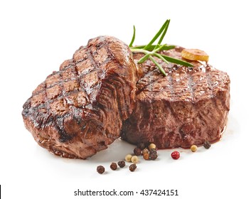 grilled beef steaks with spices isolated on white background - Shutterstock ID 437424151