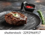 Grilled beef tenderloin steak. Restaurant menu, dieting, cookbook recipe top view.