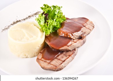 Grilled beef tongue with mashed potatoes