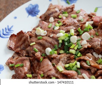 grilled beef tongue on a plate