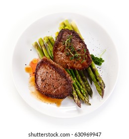 Grilled Beefsteak With Asparagus On White Background 