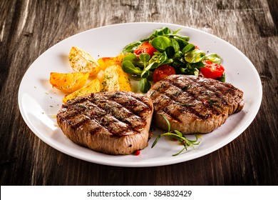 Grilled beefsteaks and vegetables  - Powered by Shutterstock