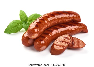 Grilled bratwurst Pork Sausages with basil leaves, close-up, isolated on white background.